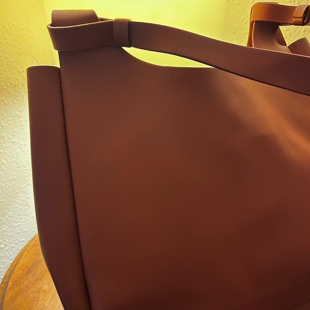 Medium/ large brown shoulder bag by Neiman Marcus